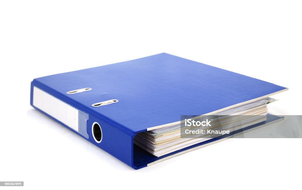 blue office binder filled with paper on white background
